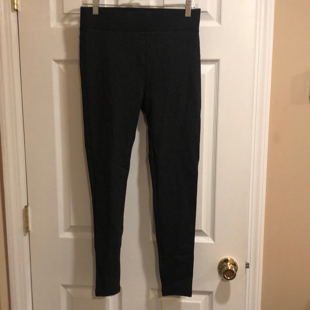 AT Loft dark gray leggings in small . Never worn but tags are gone .
